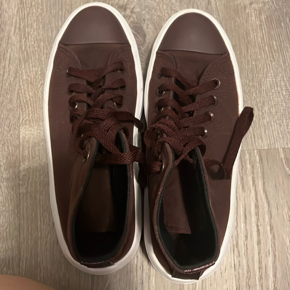 Converse I would say the color is like a purple reddish color, the size 7.5